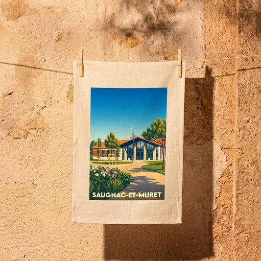 Torchon souvenir de la ville de Saugnac-et-Muret avec une illustration stylisée.