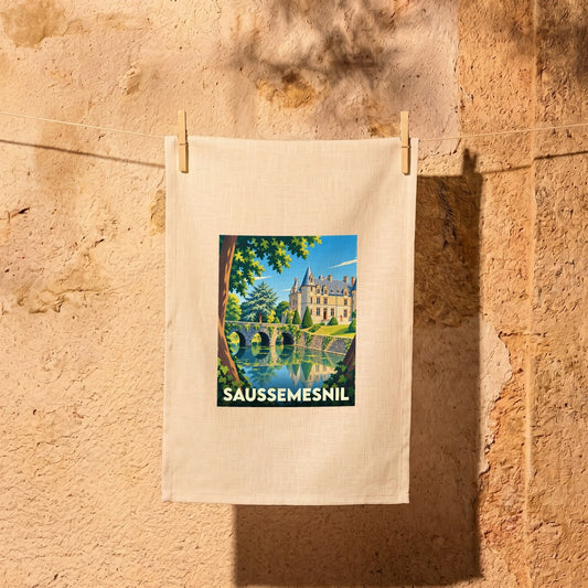 Torchon souvenir de la ville de Saussemesnil avec une illustration stylisée d'un château et de son pont.