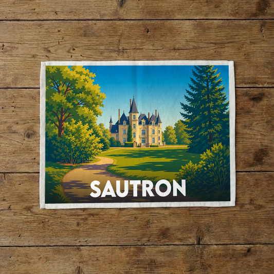 Torchon souvenir de la ville de Sautron avec une illustration stylisée représentant un château dans un parc arboré.