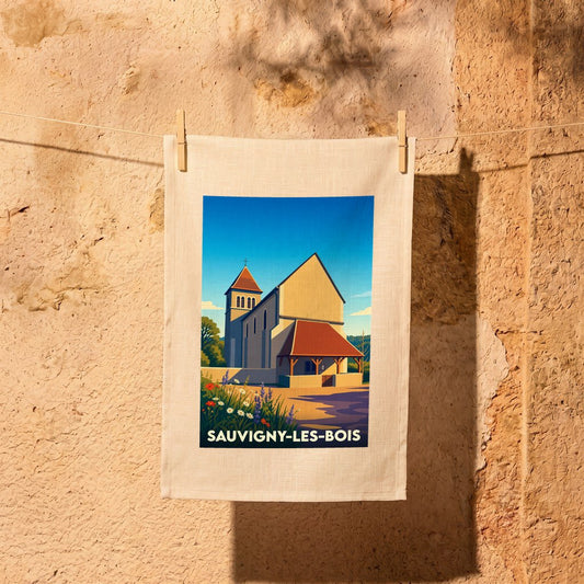 Torchon souvenir de Sauvigny-les-Bois illustré d'une vue stylisée de son église sous un ciel bleu.