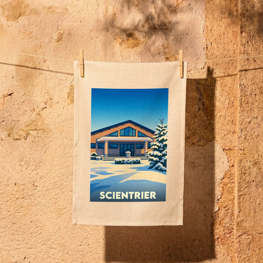 Torchon souvenir de la ville de Scientrier avec une illustration stylisée d'un paysage enneigé.