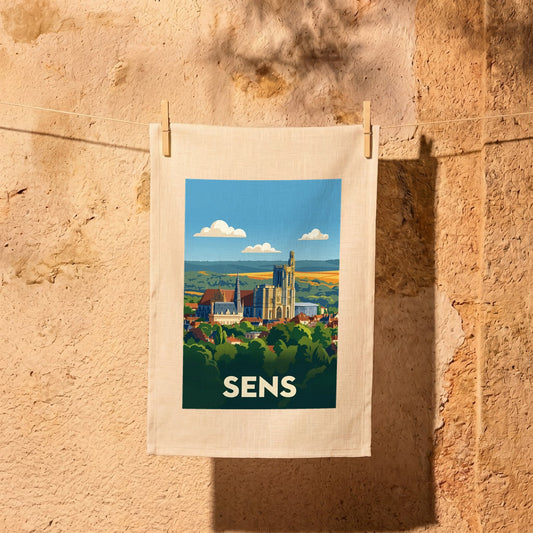 Torchon souvenir de la ville de Sens avec une illustration stylisée.
