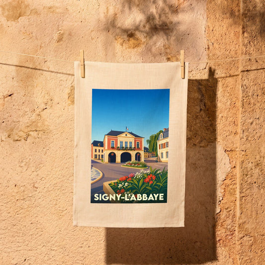 Torchon souvenir de la ville de Signy-l'Abbaye avec une illustration colorée et stylisée.