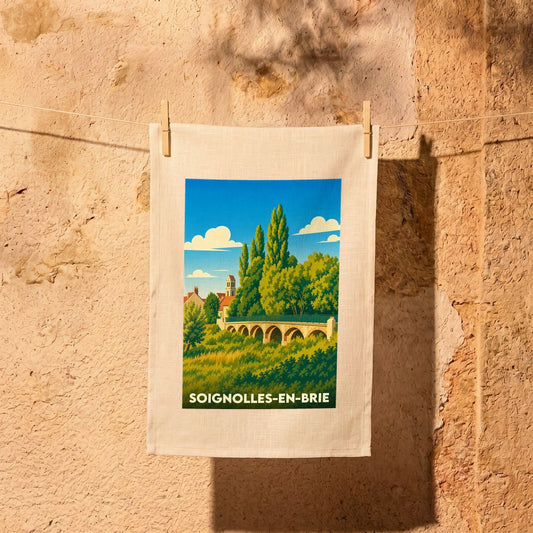 Torchon souvenir de la ville de Soignolles-en-Brie avec une illustration stylisée de son pont et de son église.