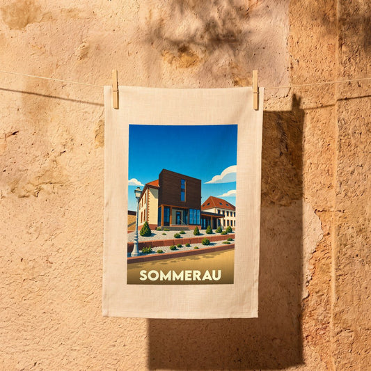 Torchon souvenir de la ville de Sommerau avec une illustration architecturale stylisée.