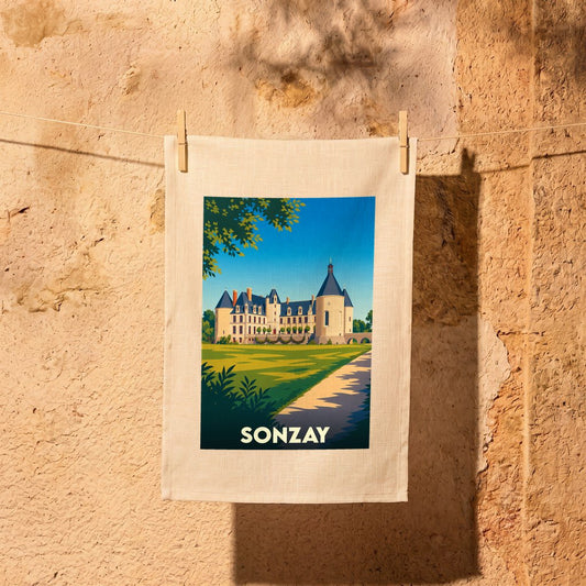 Torchon souvenir de la ville de Sonzay avec une illustration stylisée de son château.