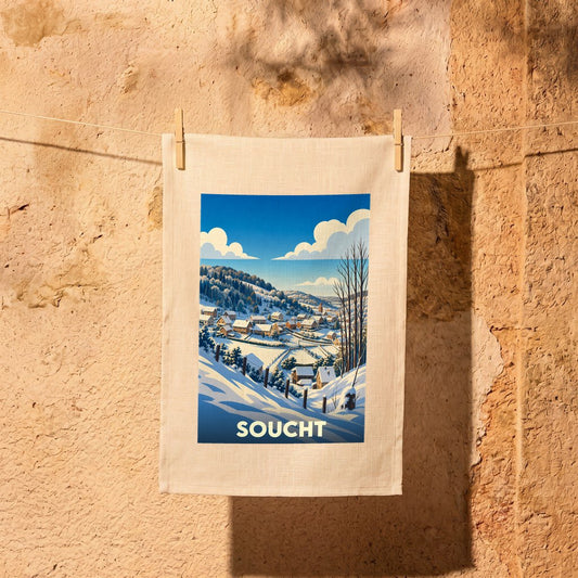Torchon souvenir de la ville de Soucht orné d'une illustration hivernale stylisée.