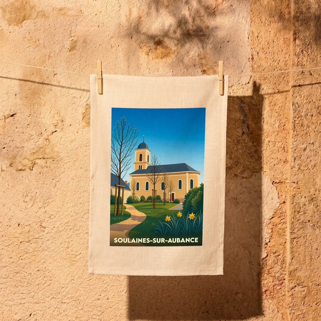 Torchon souvenir de la ville de Soulaines-sur-Aubance avec une illustration stylisée de son église.
