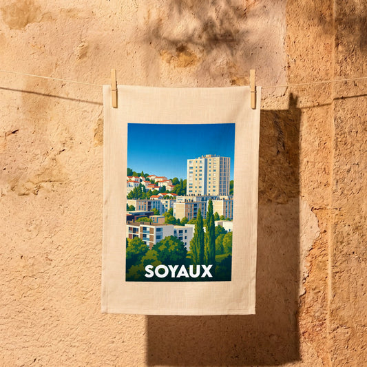 Torchon souvenir de la ville de Soyaux avec une illustration stylisée de ses immeubles et de sa végétation.