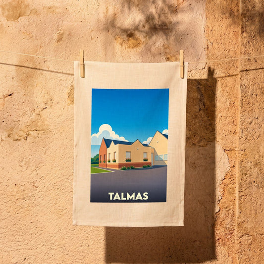 Torchon souvenir de la ville de Talmas avec une illustration stylisée.