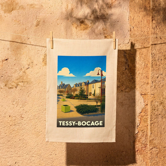 Torchon souvenir de la ville de Tessy-Bocage avec une illustration stylisée d'une place ensoleillée.