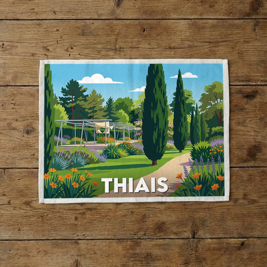 Torchon souvenir de la ville de Thiais avec une illustration stylisée d'un parc fleuri et arboré.