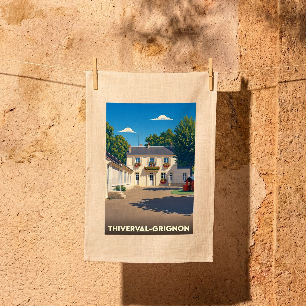 Torchon souvenir de la ville de Thiverval-Grignon avec une illustration stylisée.