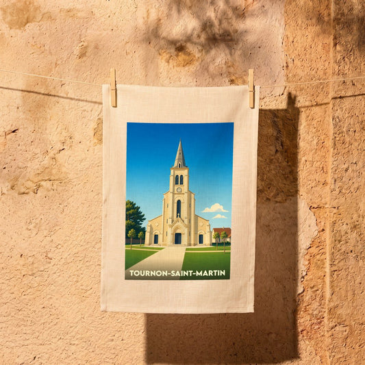 Torchon souvenir de la ville de Tournon-Saint-Martin avec une illustration stylisée de son église.