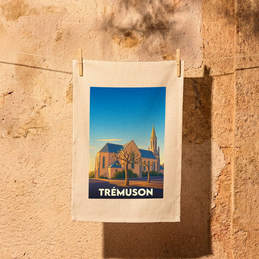 Torchon souvenir de la ville de Trémuson avec une illustration stylisée de son église.