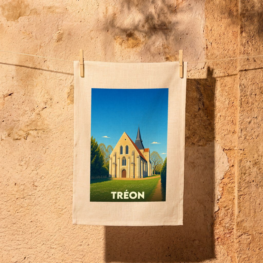 Torchon souvenir de la ville de Tréon illustré d'une église stylisée sous un ciel bleu.