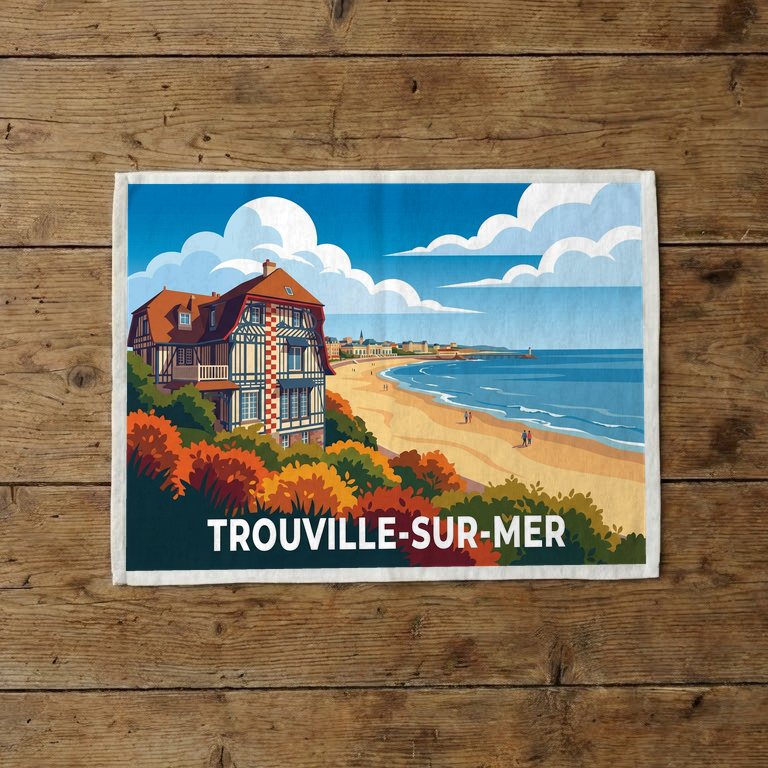 Torchon souvenir de Trouville-sur-Mer avec une illustration stylisée d'une villa normande en bord de mer.