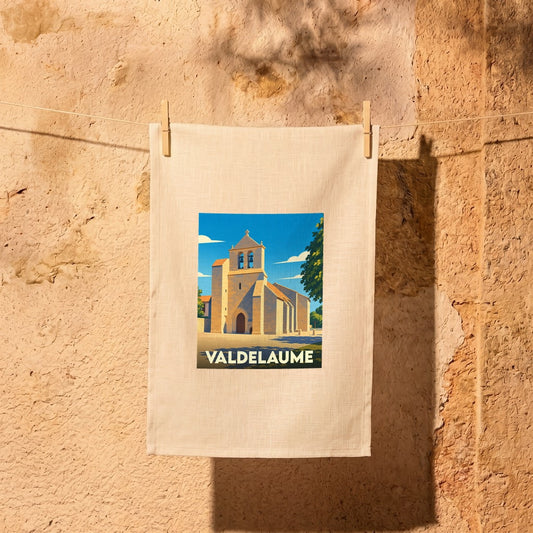 Torchon souvenir de la ville de Valdelaume avec une illustration stylisée de son église.