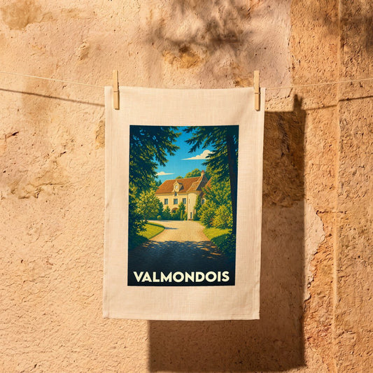 Torchon souvenir de la ville de Valmondois avec une illustration stylisée d'un manoir entouré de verdure.