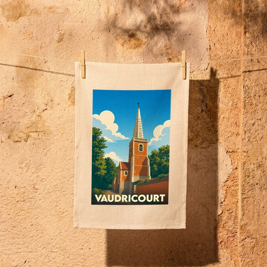 Torchon souvenir de la ville de Vaudricourt illustrant son église dans un style vintage.