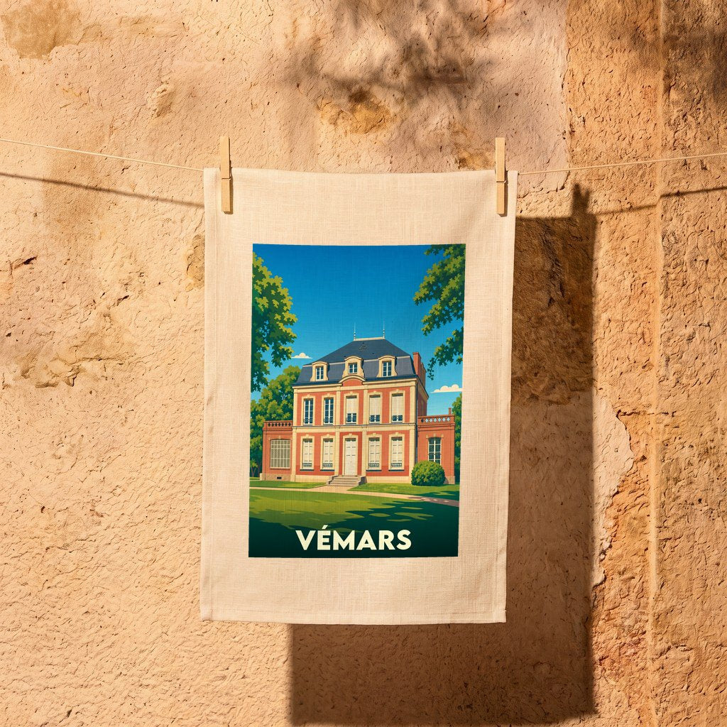 Torchon souvenir de la ville de Vémars avec une illustration stylisée d'une demeure historique.
