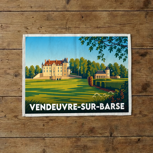 Torchon souvenir de la ville de Vendeuvre-sur-Barse avec une illustration stylisée de son château.