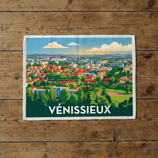 Torchon souvenir de la ville de Vénissieux avec une illustration stylisée et colorée du paysage urbain.