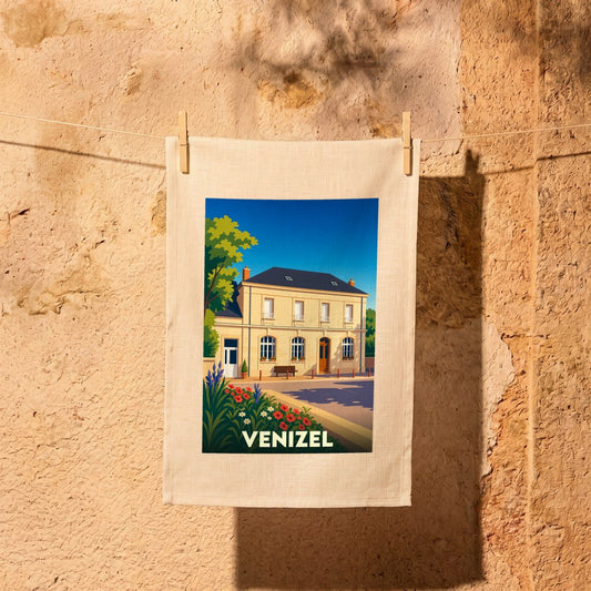 Torchon souvenir de la ville de Venizel avec une illustration stylisée d'un bâtiment typique.
