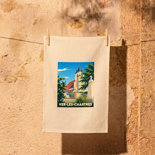 Torchon souvenir de la ville de Ver-lès-Chartres avec une illustration stylisée d'une église.