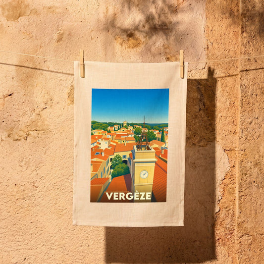 Torchon souvenir de la ville de Vergèze avec une illustration stylisée de ses toits et de son clocher.