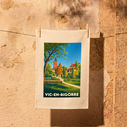 Torchon souvenir de la ville de Vic-en-Bigorre avec une illustration stylisée.
