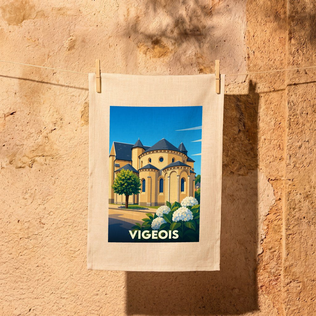 Torchon souvenir de la ville de Vigeois avec une illustration stylisée de son église abbatiale.