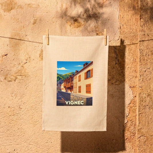 Torchon souvenir de la ville de Vignec avec une illustration stylisée.