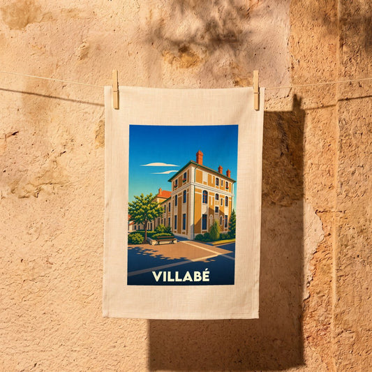 Torchon souvenir de la ville de Villabé avec une illustration stylisée d'un bâtiment emblématique sous un ciel bleu.