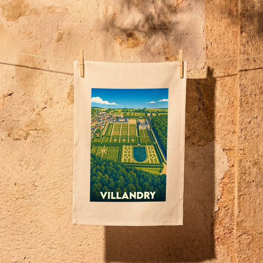 Torchon souvenir de la ville de Villandry avec une illustration stylisée de son célèbre château et de ses jardins.