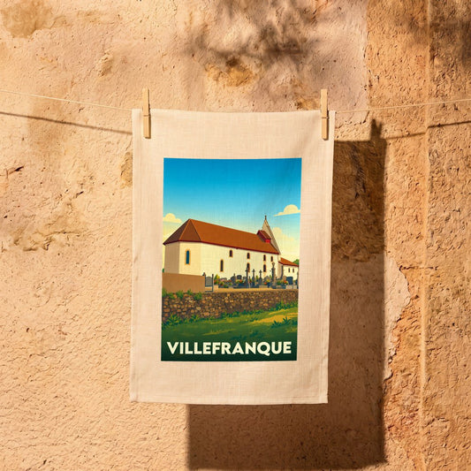 Torchon souvenir de la ville de Villefranque avec une illustration stylisée de son église.