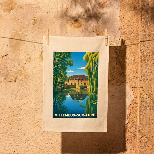 Torchon souvenir de la ville de Villemeux-sur-Eure avec une illustration stylisée d'un moulin au bord de l'eau.