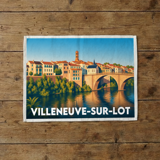 Torchon souvenir de la ville de Villeneuve-sur-Lot avec une illustration stylisée de son architecture et de son pont.
