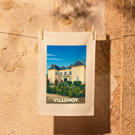 Torchon souvenir de la ville de Villenoy orné d'une illustration stylisée de son hôtel de ville.