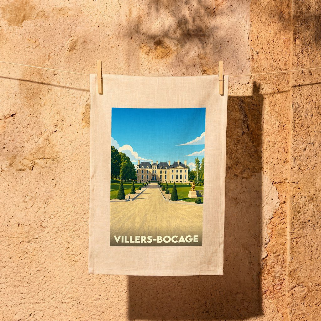 Torchon souvenir de la ville de Villers-Bocage avec une illustration stylisée d'un château.
