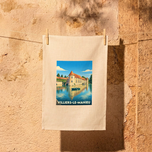 Torchon souvenir de la ville de Villiers-le-Mahieu avec une illustration stylisée de son château.