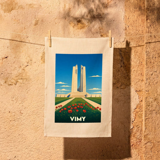 Torchon souvenir de la ville de Vimy avec une illustration stylisée du mémorial et de coquelicots.