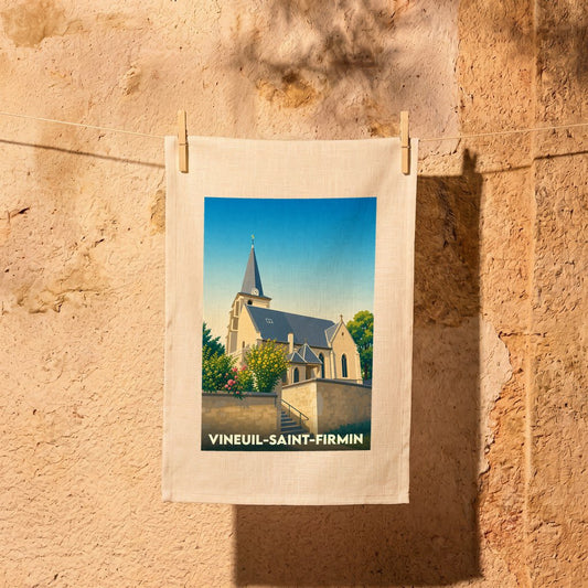 Torchon souvenir de la ville de Vineuil-Saint-Firmin avec une illustration stylisée de son église.