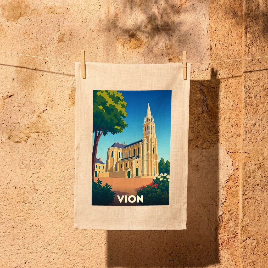 Torchon souvenir de la ville de Vion avec une illustration stylisée de son église.