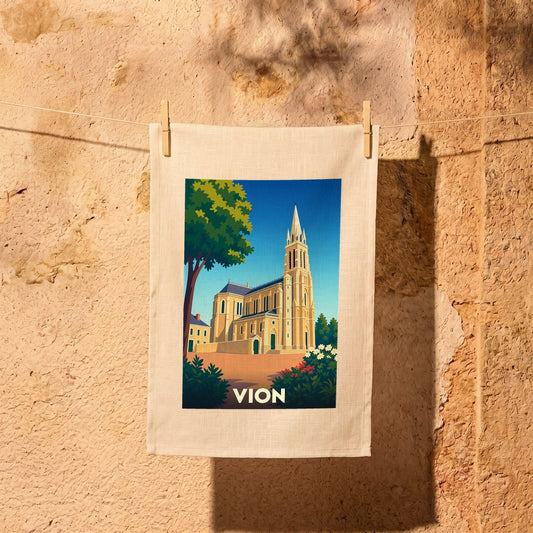 Torchon souvenir de la ville de Vion avec une illustration stylisée de son église.