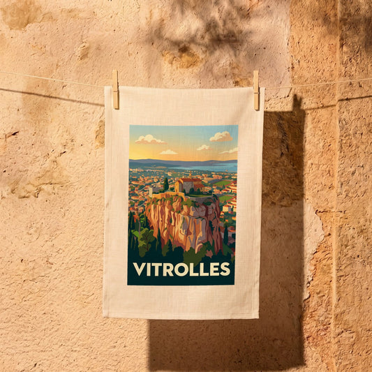 Torchon souvenir de la ville de Vitrolles avec une illustration stylisée de son célèbre rocher.