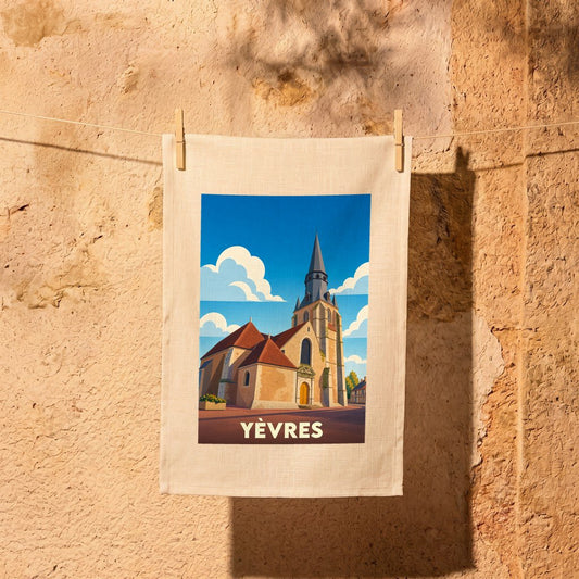 Torchon souvenir de la ville de Yèvres avec une illustration stylisée d'une église sous un ciel bleu.