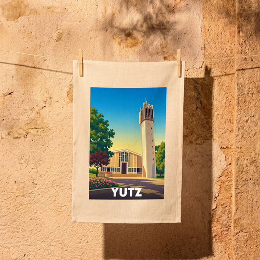 Torchon souvenir de la ville de Yutz avec une illustration stylisée de l'église Saint-Joseph et son clocher.