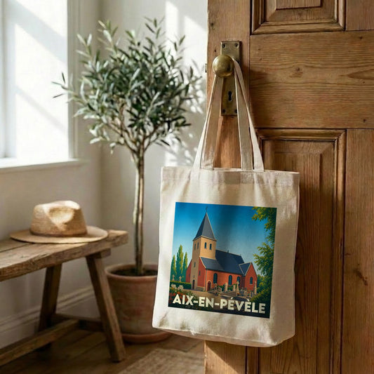 Tote bag souvenir de la ville de Aix-en-Pévèle avec une illustration stylisée de son église.