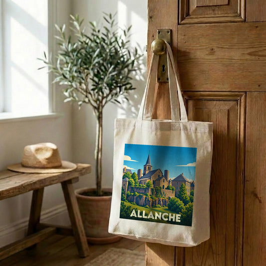 Tote bag souvenir de la ville d'Allanche avec une illustration stylisée d'un paysage urbain historique.